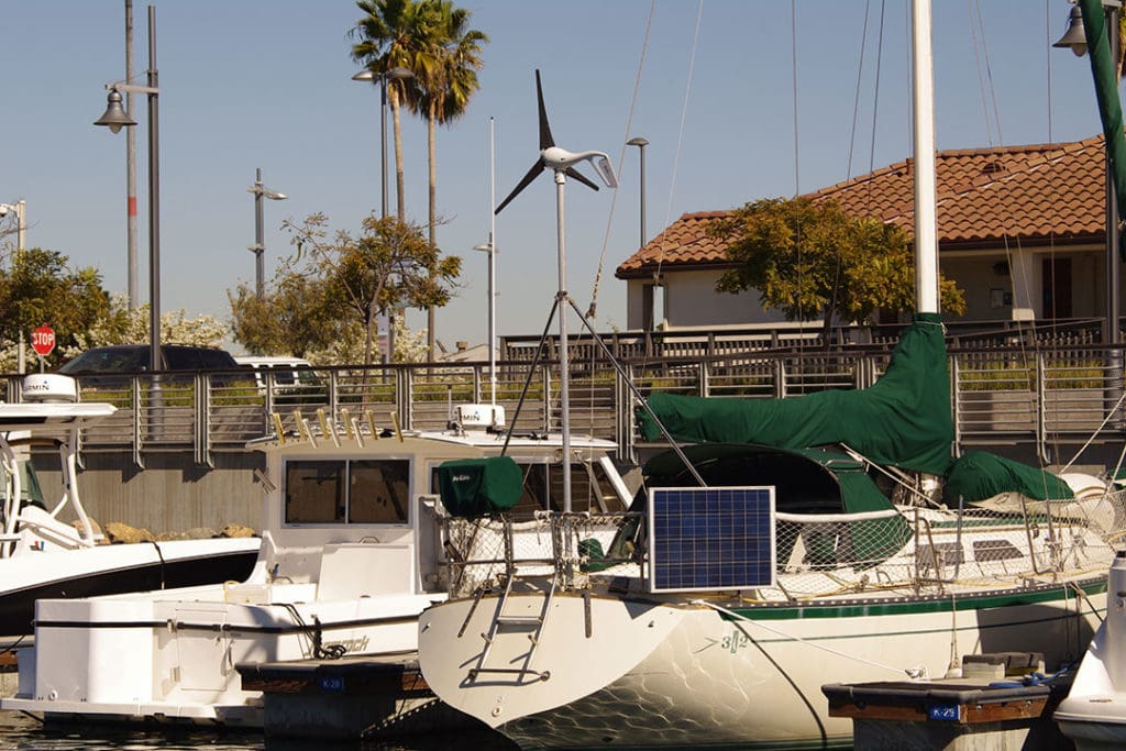An Air X wind generator paired with a solar panel that can be adjusted to maximize its angle to the sun.