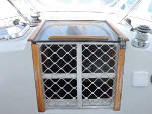 A security gate for use in the main hatch that denies access but allows for ventilation.
