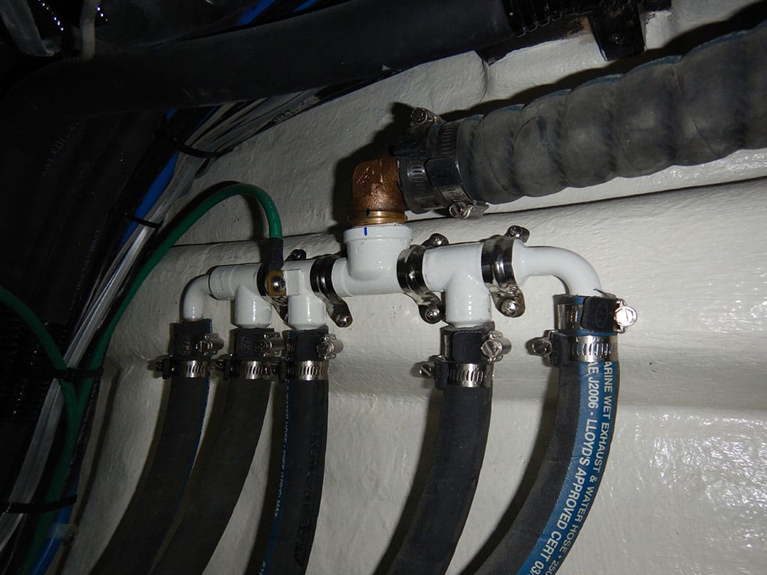 A bronze manifold, which supplies raw water to multiple HVAC condensers. The bonding wire, while not harmful, will provide no cathodic protection as the manifold is much too far away from any sacrificial anodes.