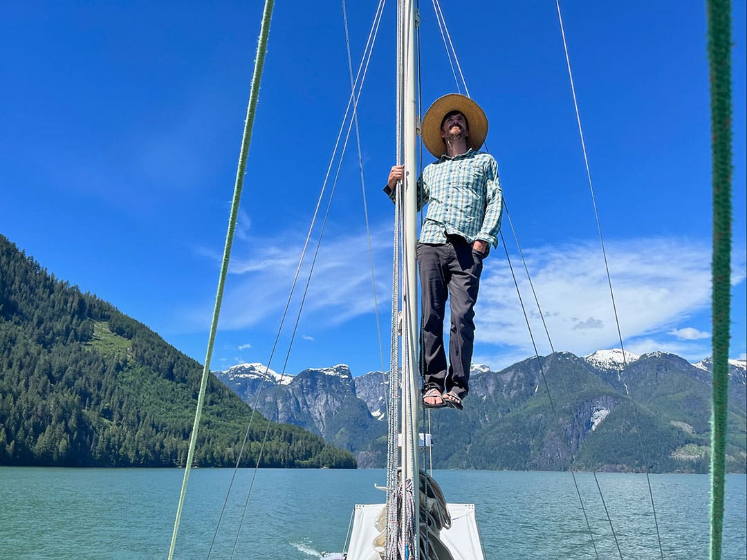 Capt. Luke up on Seaweed’s mast in Toba Inlet, BC.