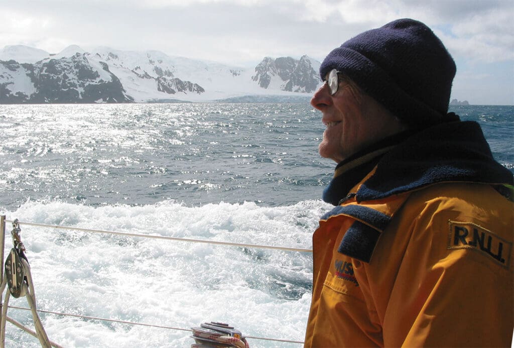 Ocean Navigator contributing editor Eric Forsyth sailing his Westsail 42, Fiona, in Antarctic waters.