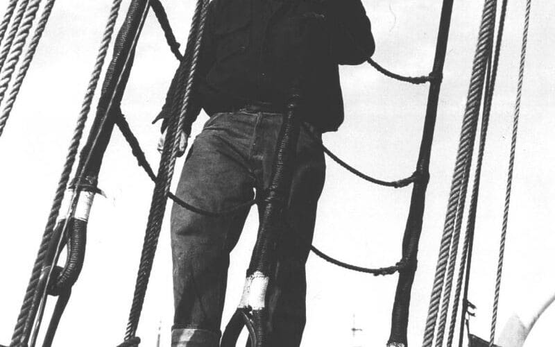 Ernest K. Gann in the rigging of Albatros. The brigantine was built in the Netherlands and Gann kept the Dutch spelling of the name.