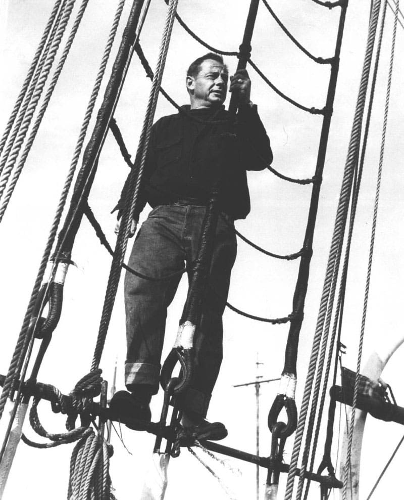 Ernest K. Gann in the rigging of Albatros.  The brigantine was built in  the Netherlands and Gann kept the Dutch spelling of the name. 