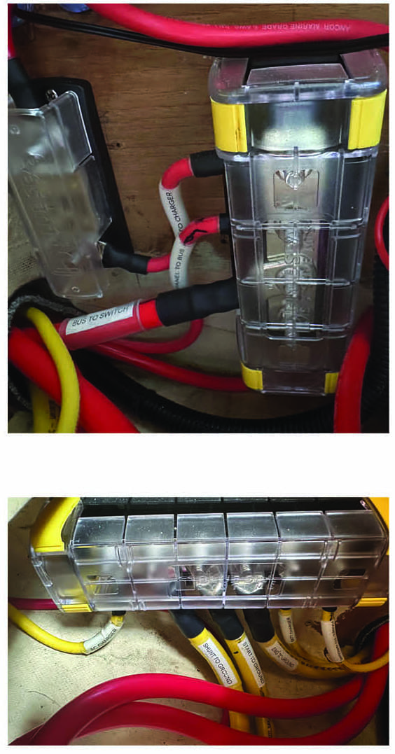 Above, the new positive bus. Below, the new negative bus assembly. Both units have protective plastic covers. 