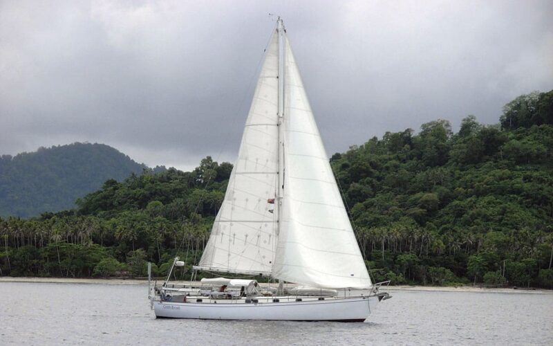 Oddly Enough, Ann and Tom Hoffner’s Peterson 44, under sail in Fiji.