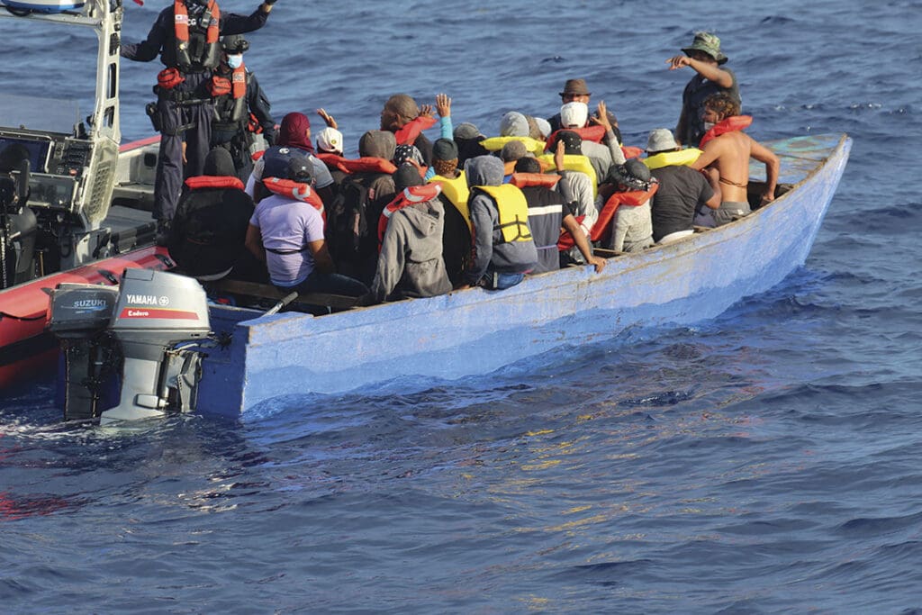 A yola is intercepted by the U.S. Coast Guard in the Mona Passage.