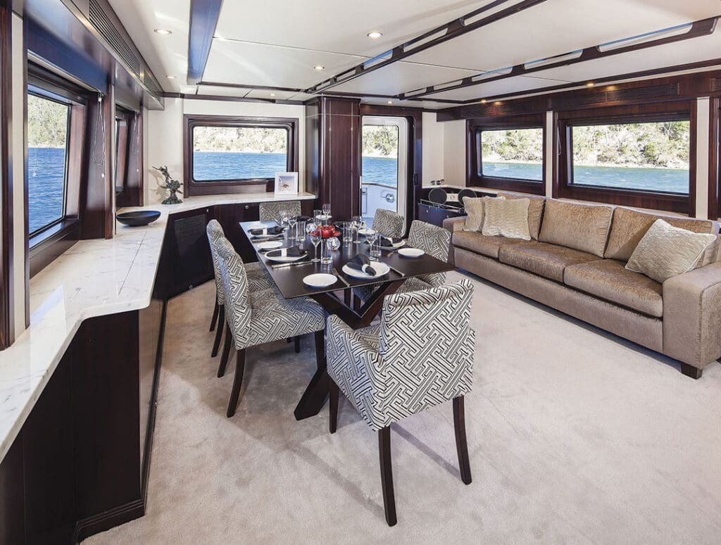 The dining area of the sumptuous Nordhavn 68 belies the power, speed and stability of this ocean-going motoryacht.
