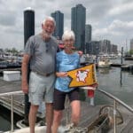 Jane and Harry with AGLCA Gold Burgee.